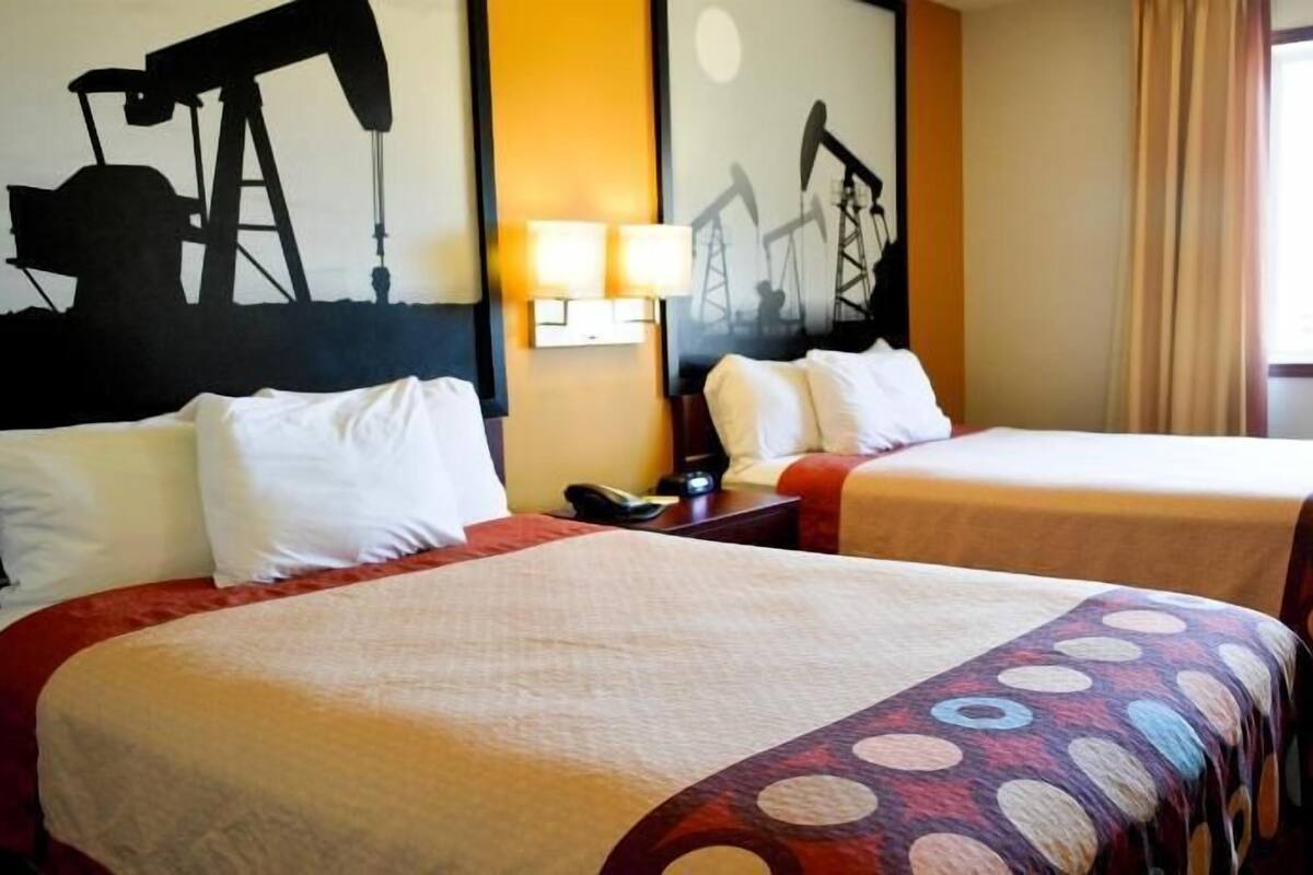 Desk, laptop workspace, blackout curtains, free WiFi