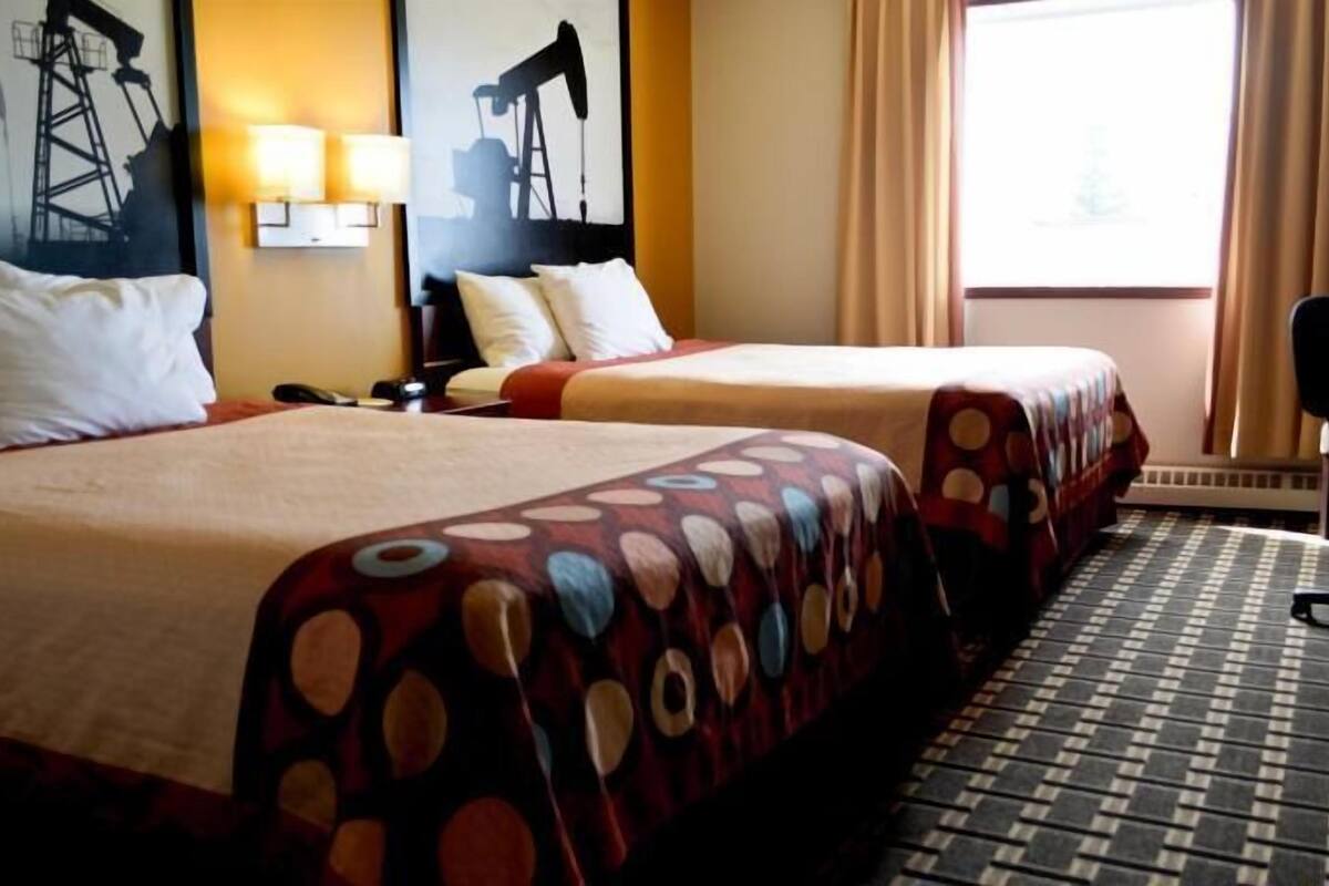 Desk, laptop workspace, blackout curtains, free WiFi