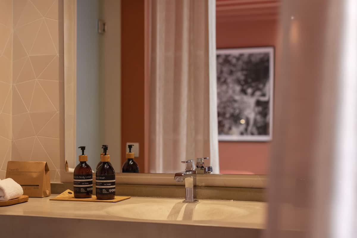 rainfall showerhead, designer toiletries, hair dryer, bathrobes