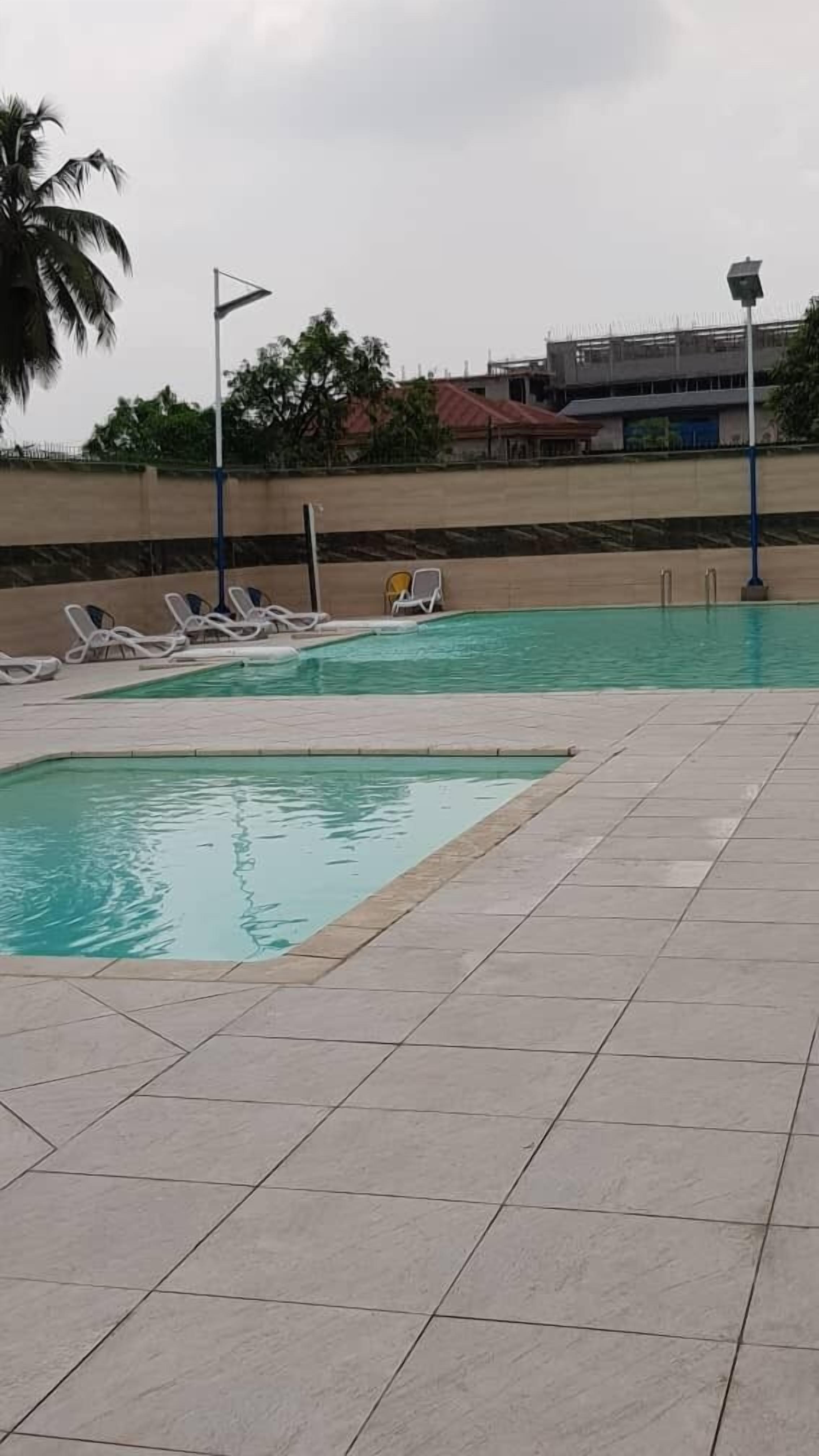 Seasonal outdoor pool, pool umbrellas