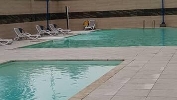 Seasonal outdoor pool, pool umbrellas