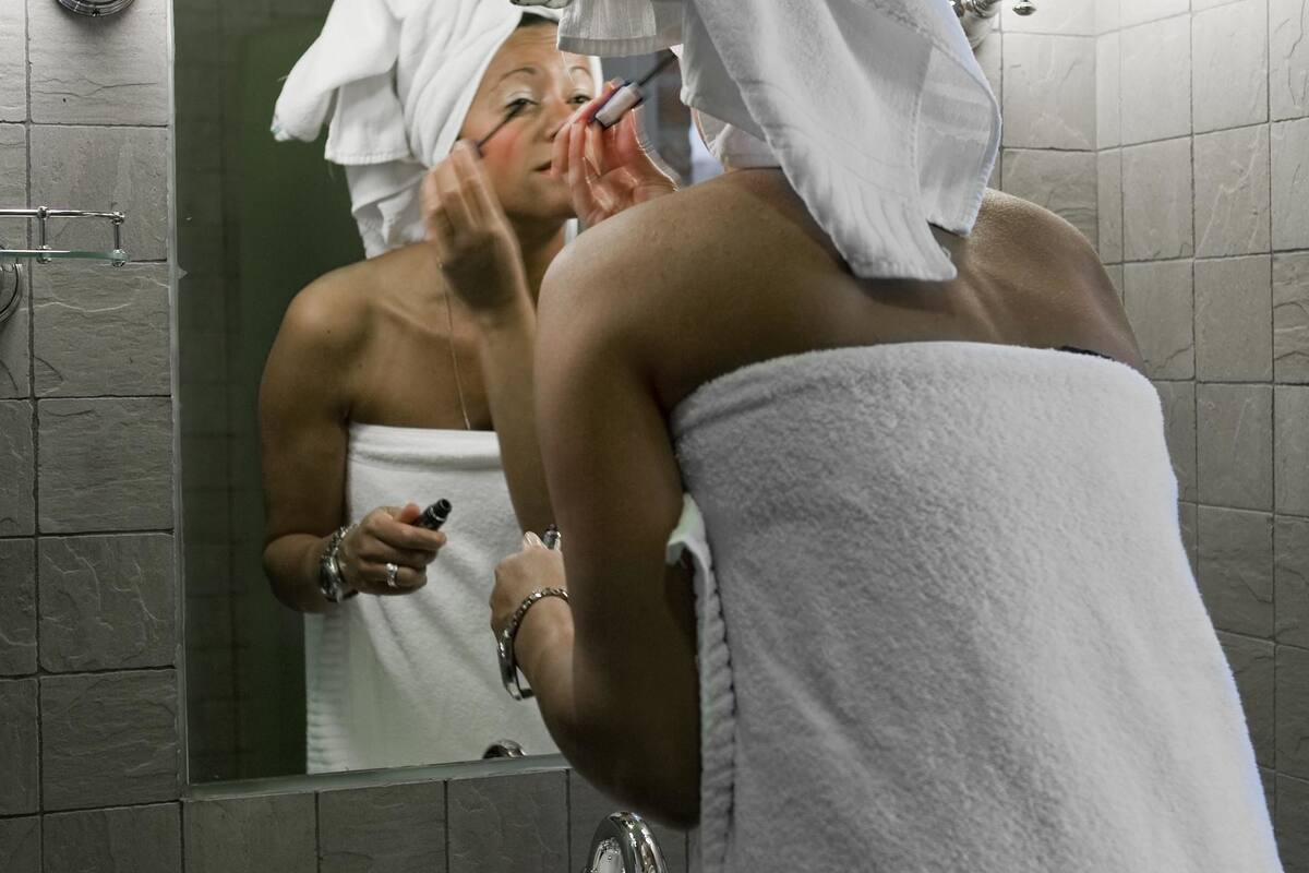 shower, rainfall showerhead, hair dryer, towels