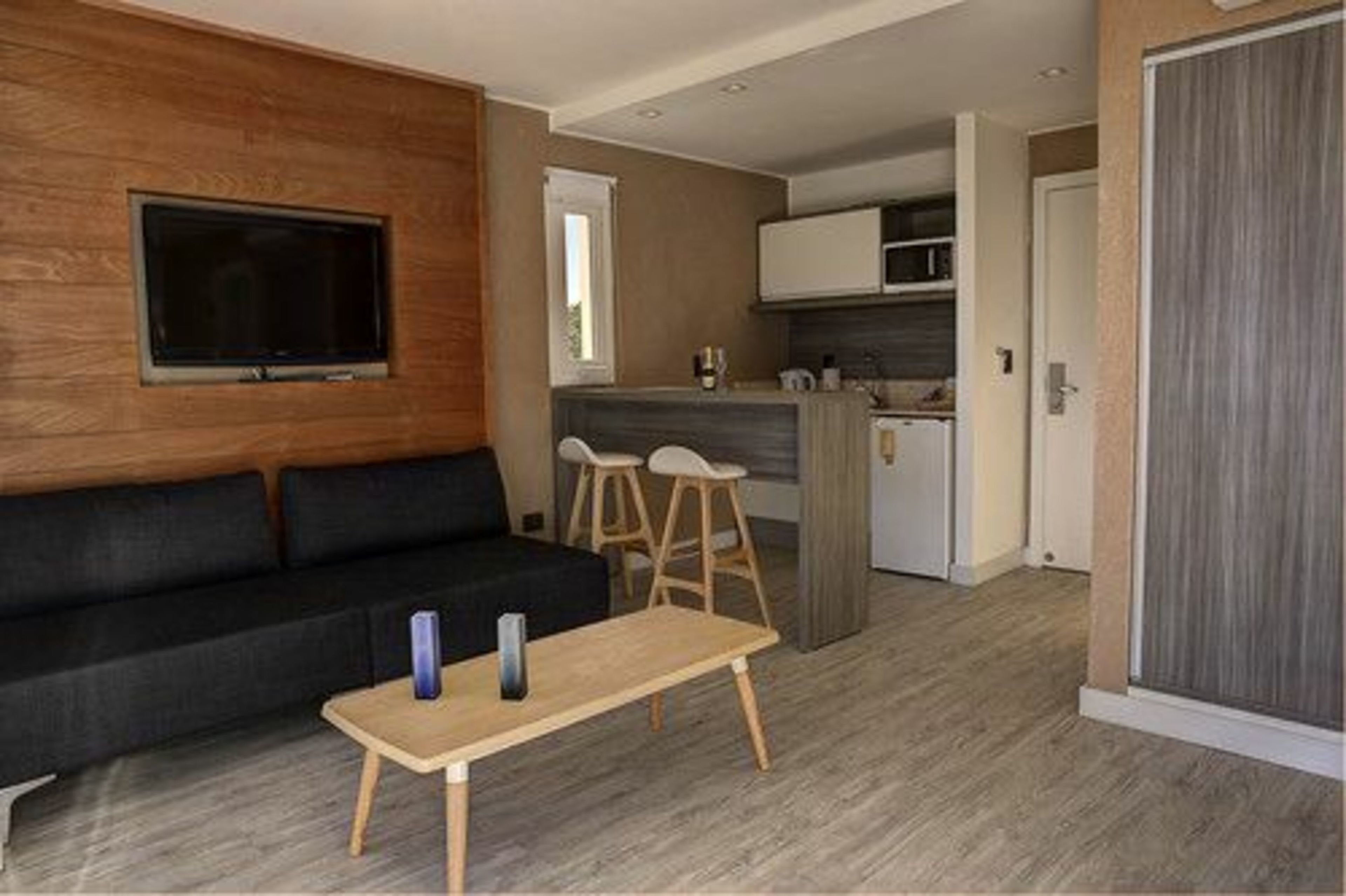 double room, balcony | living area | 32-inch lcd tv with cable channels, tv, dvd player