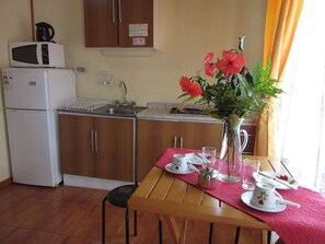 Double Bungalow Double Matrimonial | Private kitchen | Fridge, microwave, coffee/tea maker