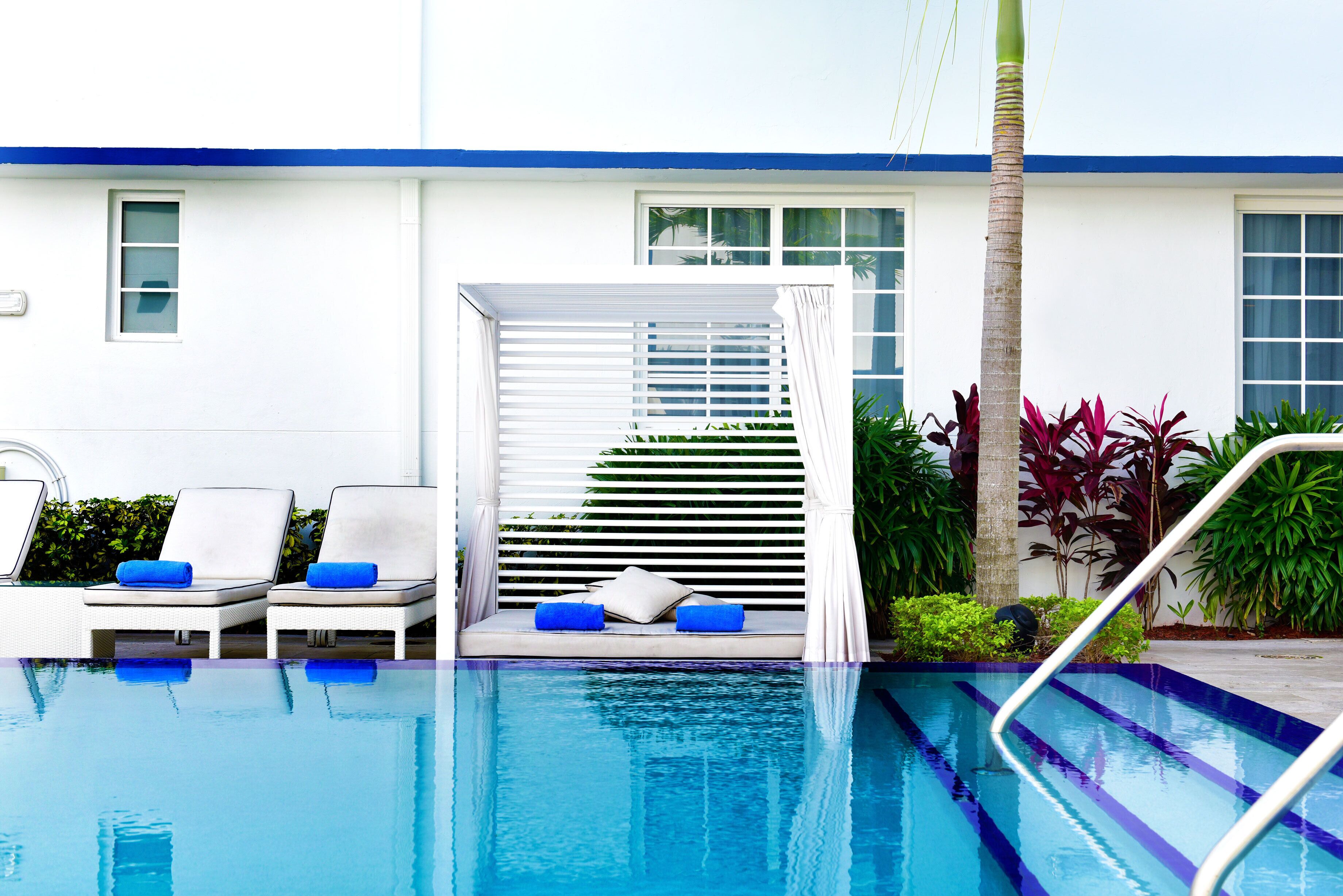 outdoor pool, pool umbrellas, pool loungers