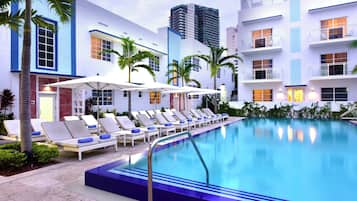 Outdoor pool, pool umbrellas, pool loungers