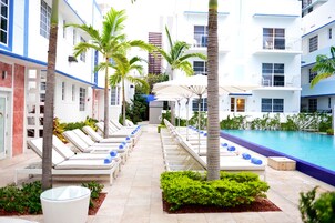 Outdoor pool, pool umbrellas, sun loungers