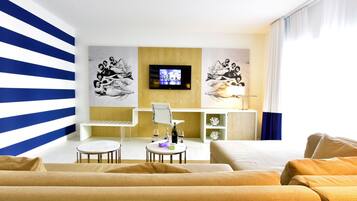 Suite, 1 Bedroom, Pool View | Living area | 45-inch LED TV with cable channels, TV, pay movies