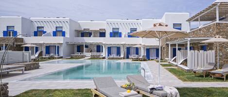 Seasonal outdoor pool, pool umbrellas, pool loungers