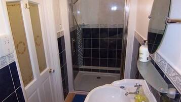 Shower, free toiletries, hair dryer, towels