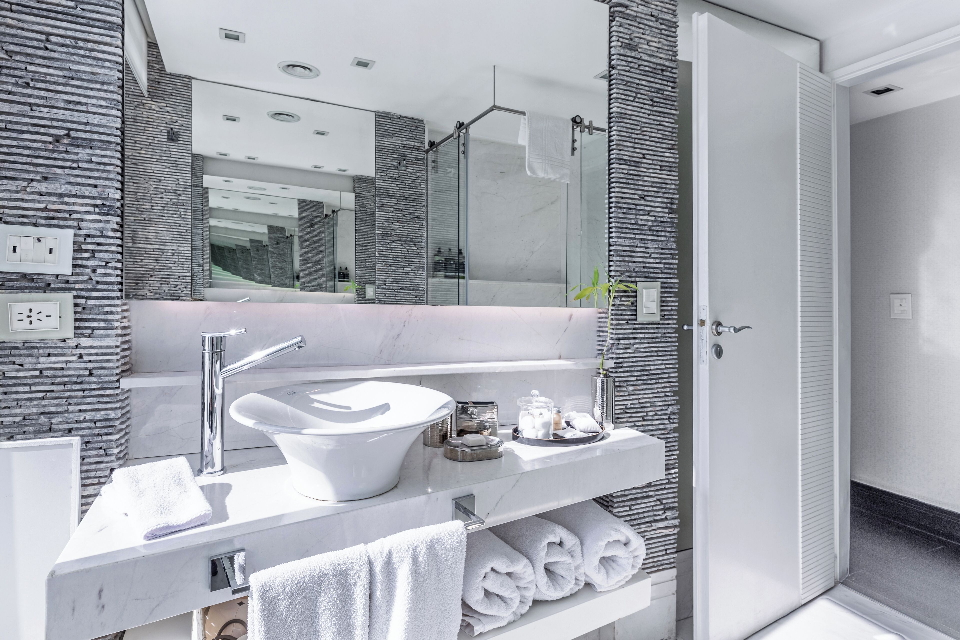 luxury suite | bathroom | shower, rainfall showerhead, eco-friendly toiletries, hair dryer