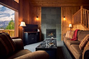 Deluxe Cabin | Living room | Flat-screen TV, fireplace, DVD player, table tennis - Banff Gate Mountain Resort (Canmore)