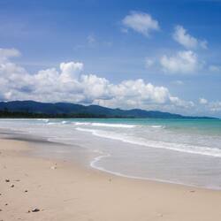 On the beach, sun-loungers, beach towels