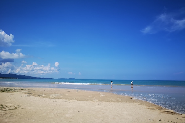 On the beach, sun-loungers, beach towels