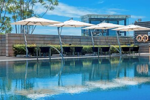 Outdoor pool, open 7:00 AM to 10:00 PM, pool umbrellas - The Oct Harbour, Shenzhen - Marriott Executive Apartments (Shenzhen)