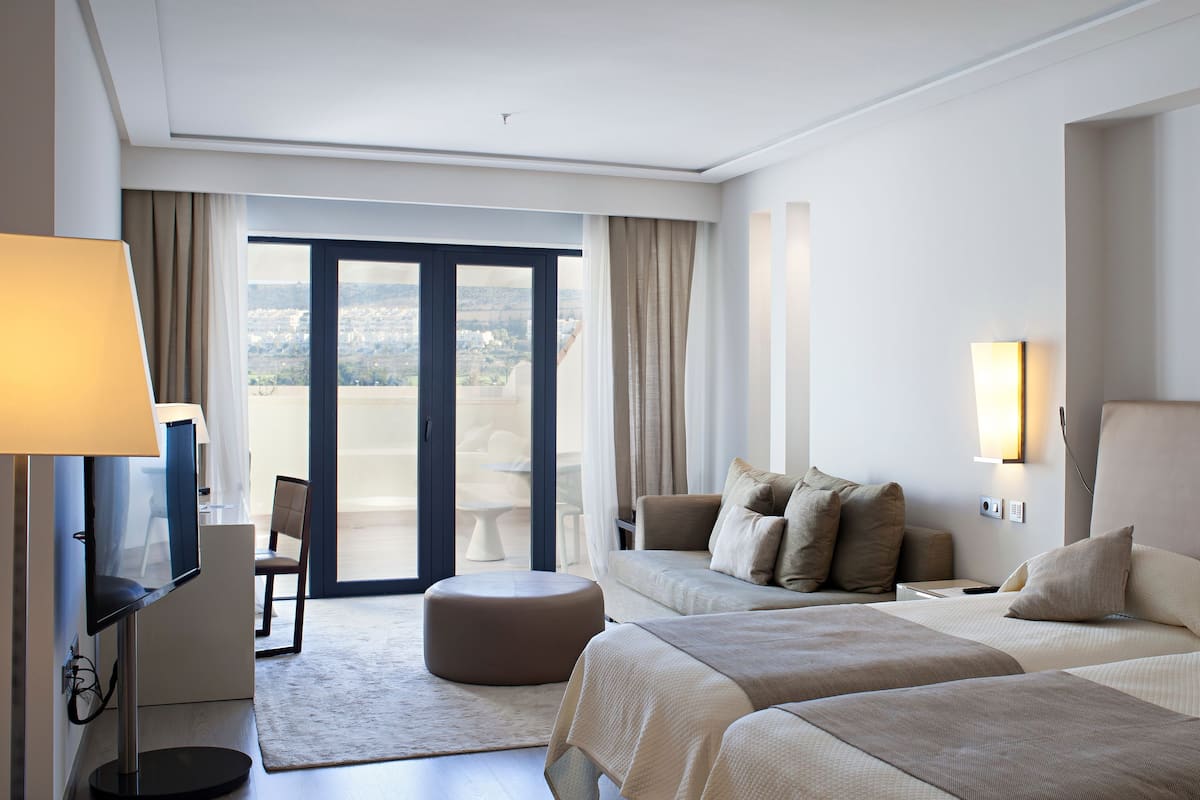 hypo-allergenic bedding, down duvets, minibar, in-room safe