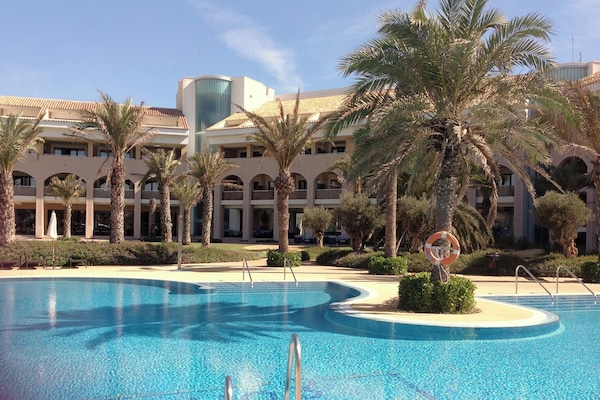 2 outdoor pools, sun loungers