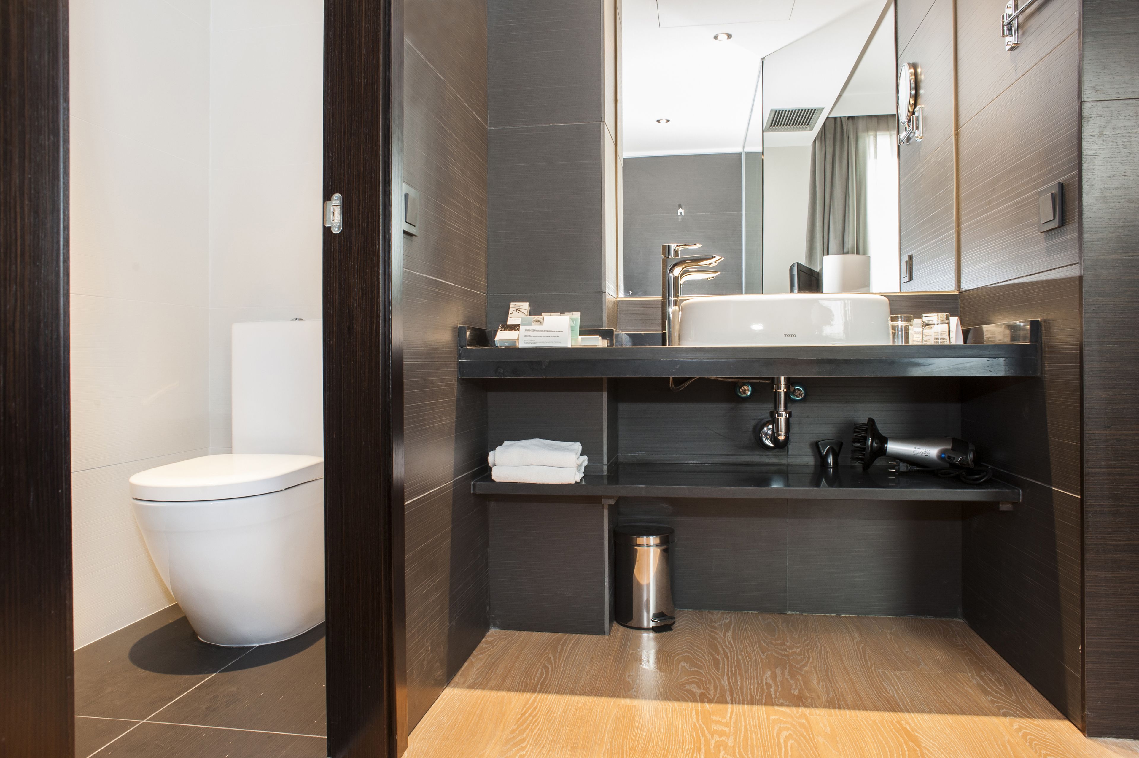 deep-soaking bathtub, rainfall showerhead, eco-friendly toiletries