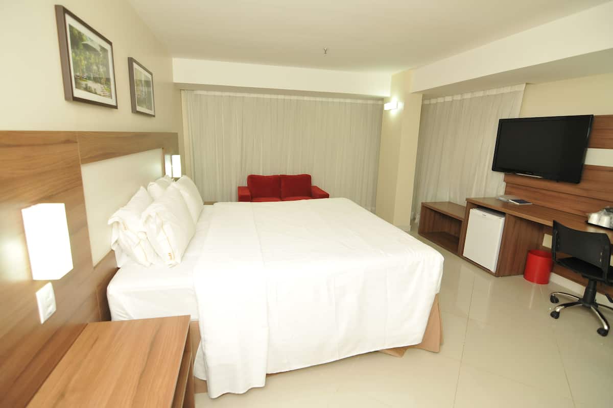 standard room, 1 king bed (top floor) | in-room safe, desk, soundproofing, iron/ironing board