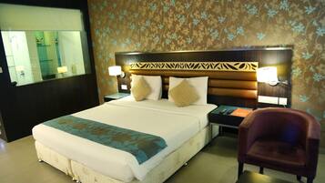 Free minibar items, in-room safe, blackout curtains, iron/ironing board