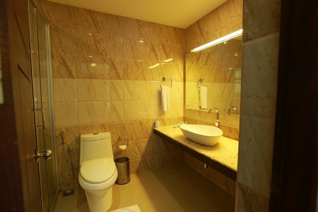 superior lake view room | bathroom | shower, rainfall showerhead, free toiletries, hair dryer