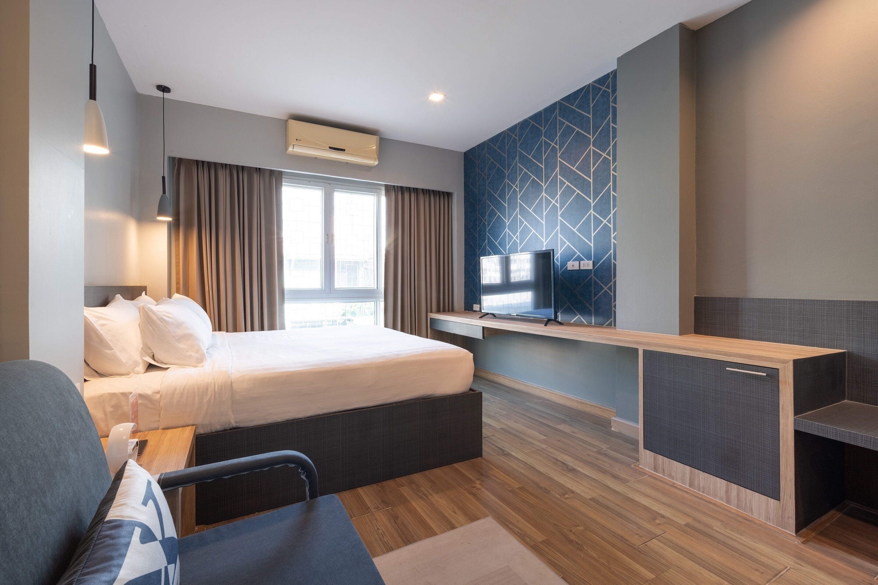 premier triple room | minibar, in-room safe, desk, blackout curtains