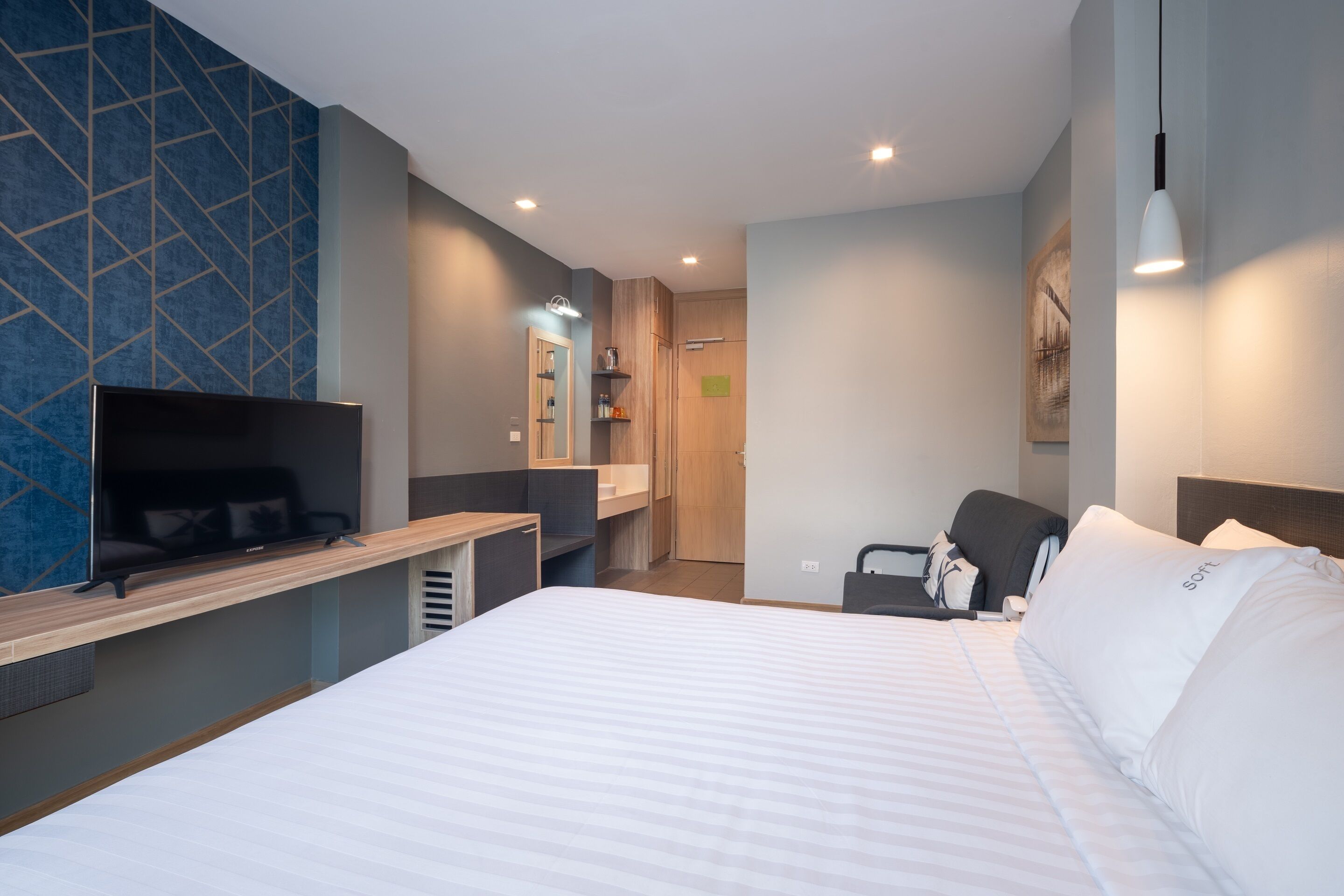 premier triple room | minibar, in-room safe, desk, blackout curtains