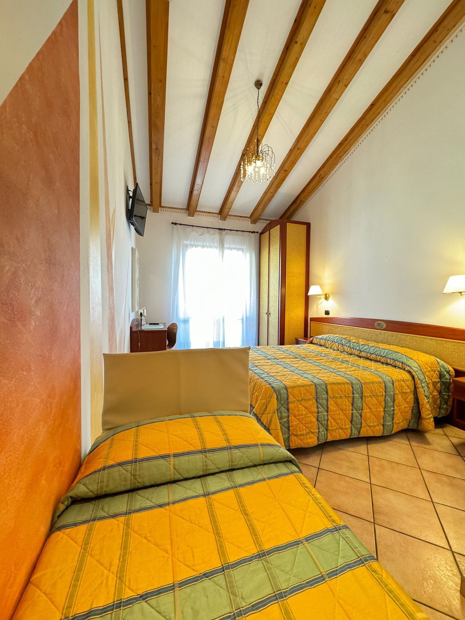 deluxe triple room | frette italian sheets, premium bedding, in-room safe, desk