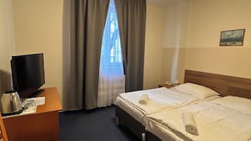 双人房或双床房 | 客房内保险箱、免费 WiFi、床单