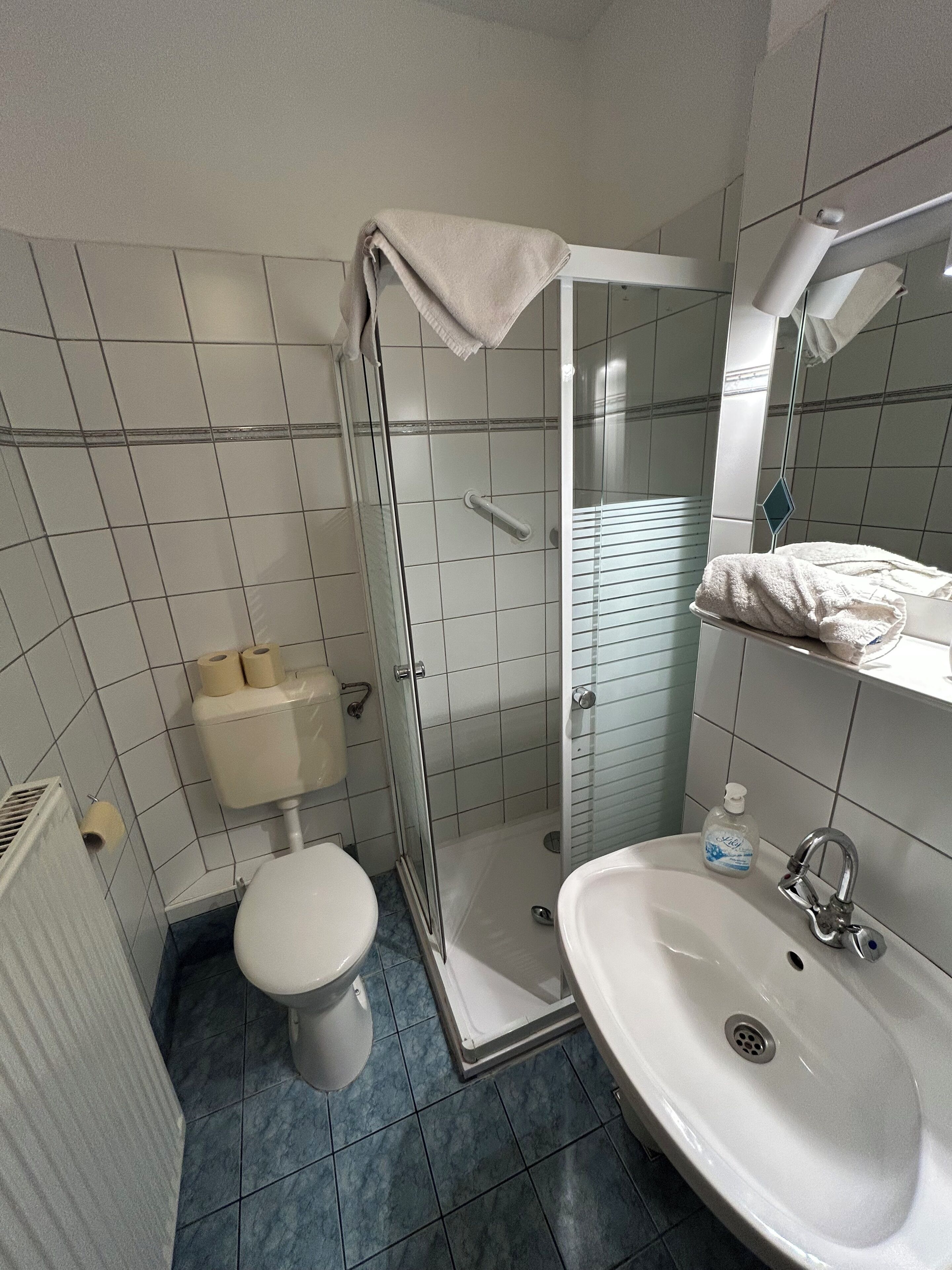 family room for  2 adults and 1 child | bathroom | towels