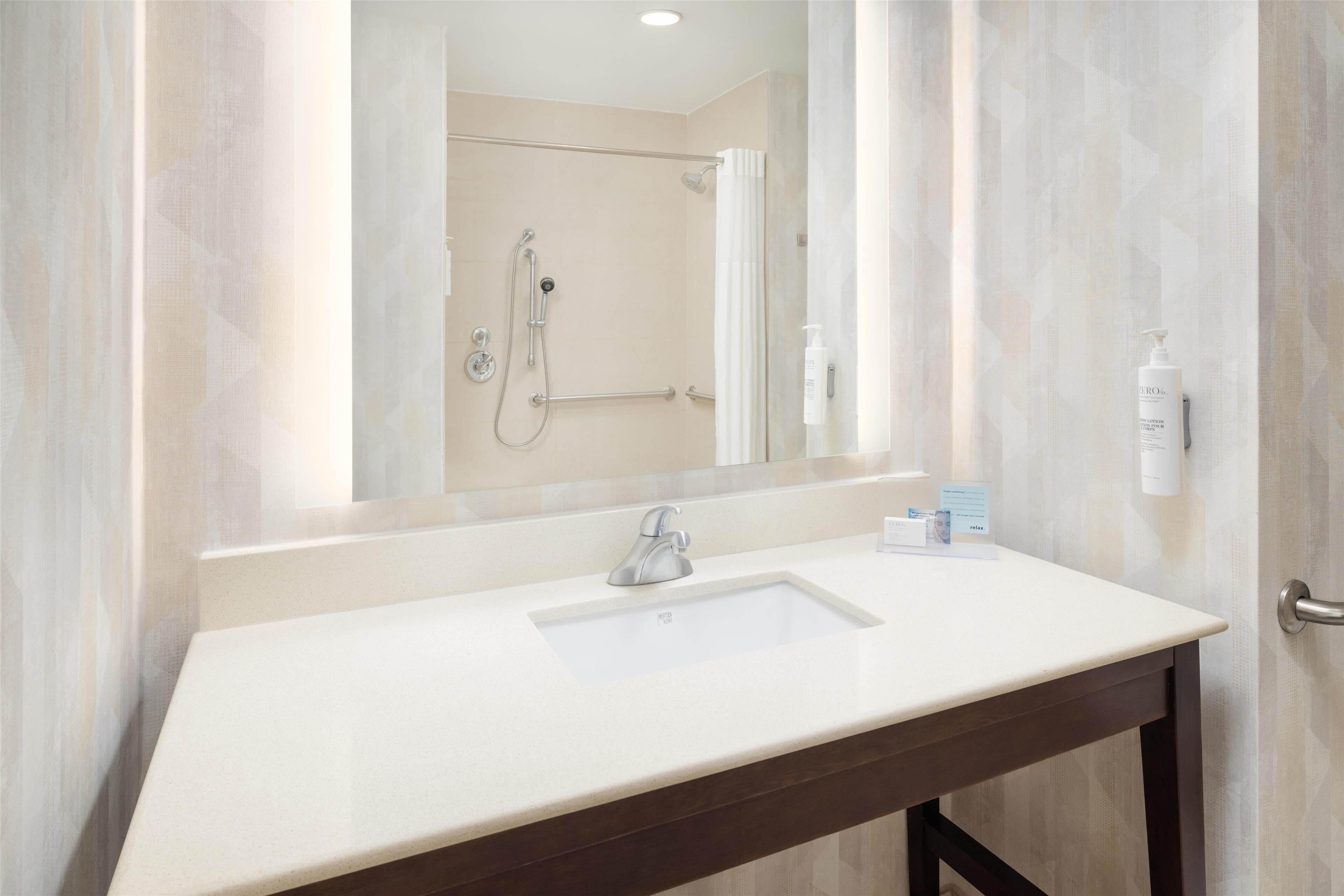 room, 1 king bed, accessible, non smoking | bathroom | rainfall showerhead, free toiletries, hair dryer, towels