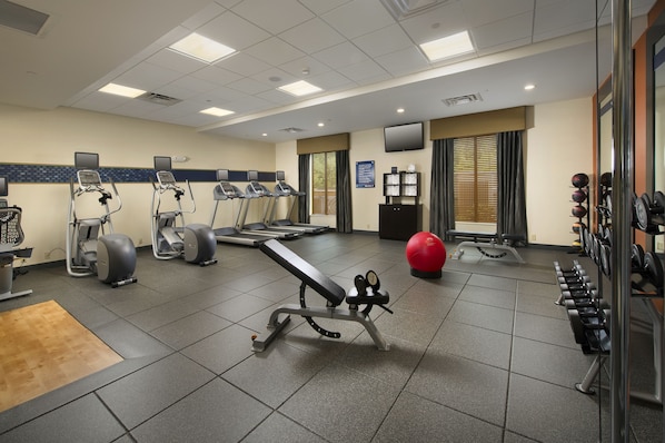Stay fit on the go with our fully equipped gym featuring treadmills, elliptical trainers, and a bench press.