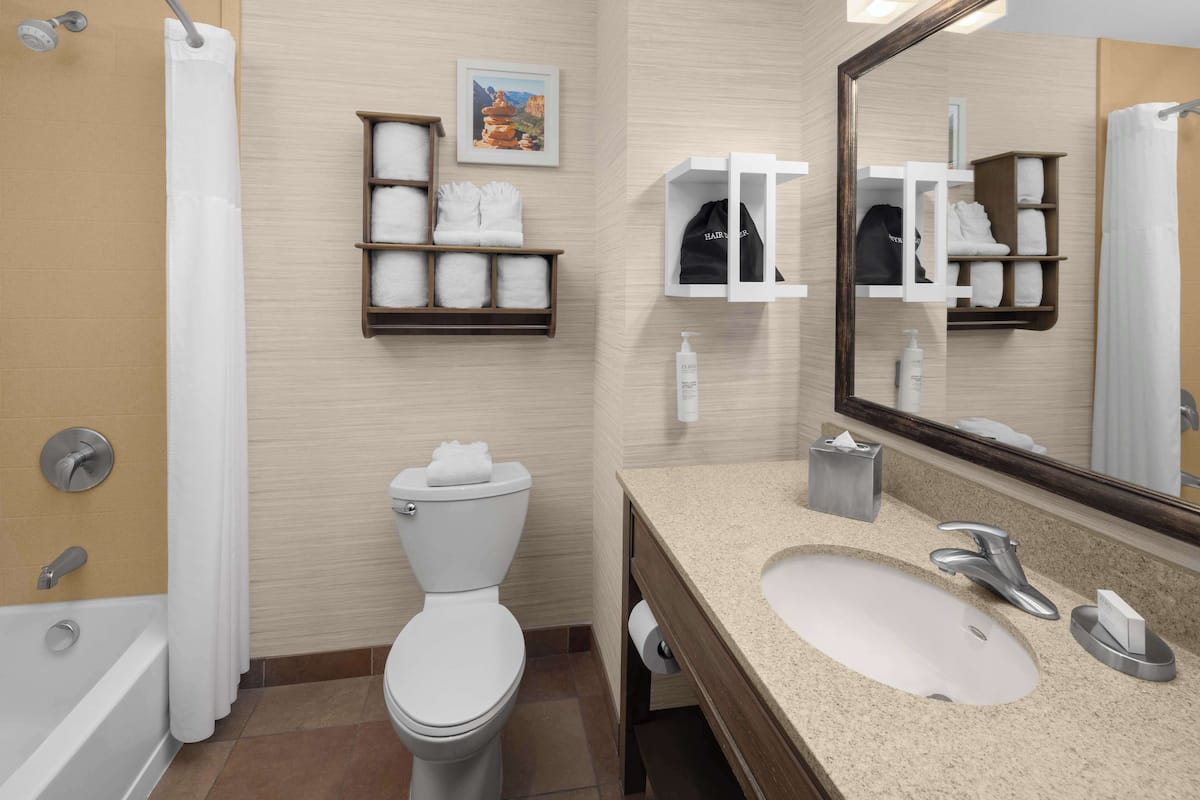 standard room, 2 queen beds | bathroom | hair dryer, towels