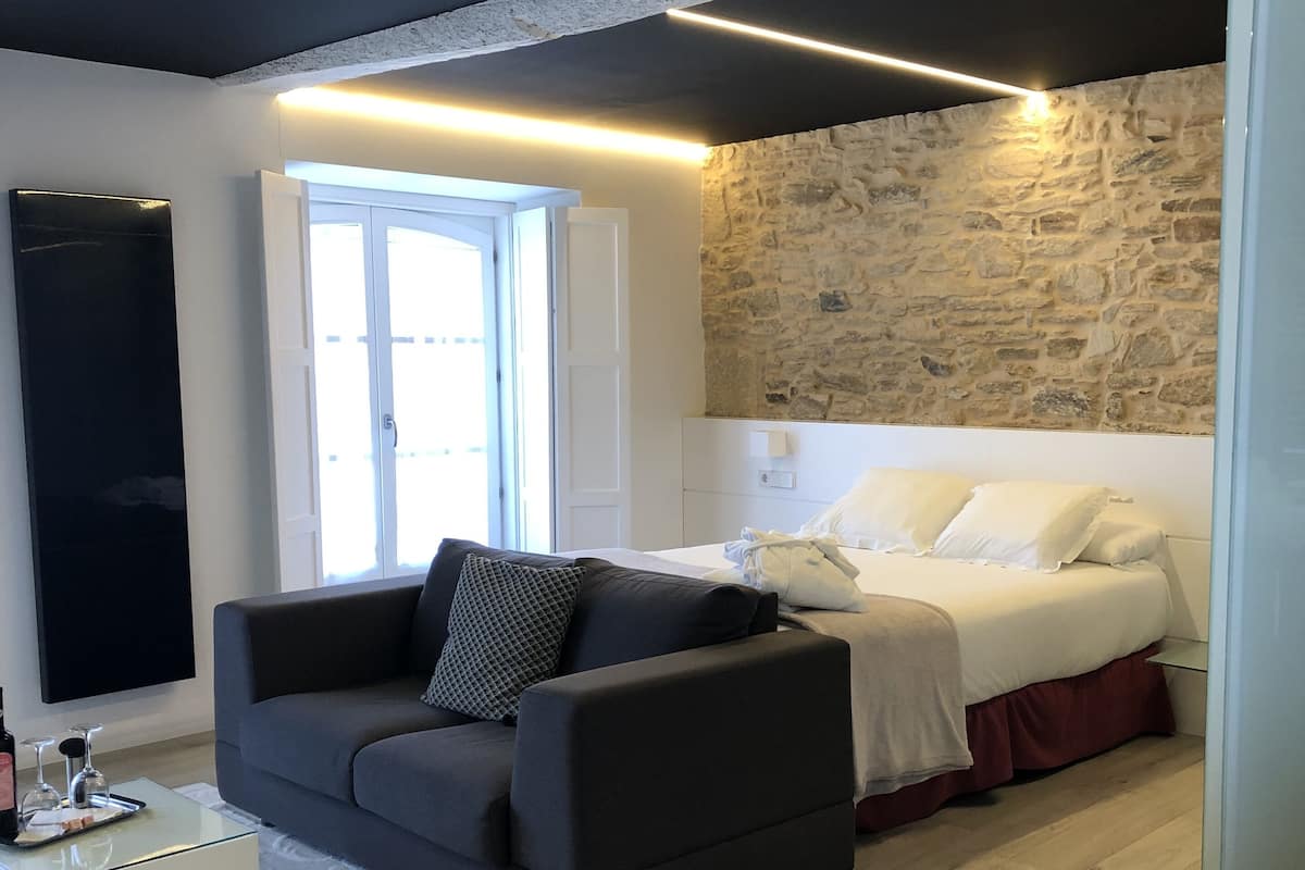 Premium bedding, down comforters, desk, laptop workspace