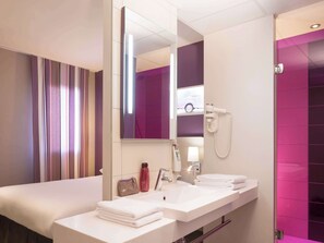 Eco-friendly toiletries, hair dryer, towels