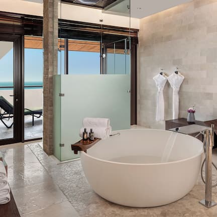 Suite, 4 Bedrooms, Terrace (The Palm) | Bathroom | Separate tub and shower, rainfall showerhead, eco-friendly toiletries