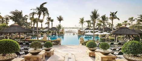 5 outdoor pools, open 9:00 AM to 6:00 PM, pool cabanas (surcharge)