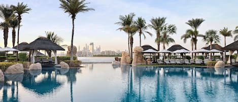 5 outdoor pools, open 9:00 AM to 6:00 PM, cabanas (surcharge)
