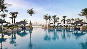 5 outdoor pools, open 9:00 AM to 6:00 PM, pool cabanas (surcharge)