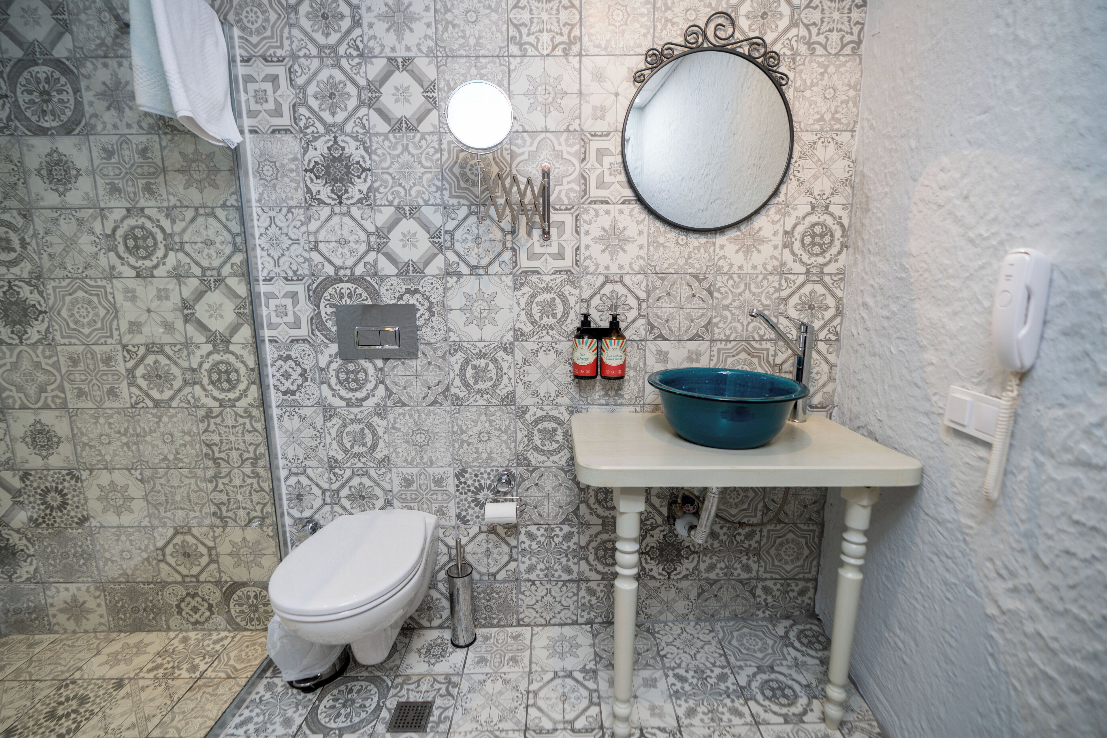 shower, rainfall showerhead, designer toiletries, hair dryer