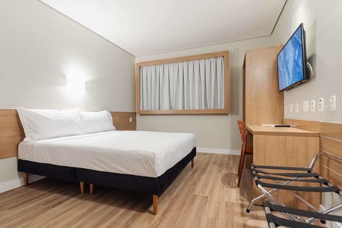 Standard Apartment, 1 Double Bed | Minibar, in-room safe, desk, blackout drapes