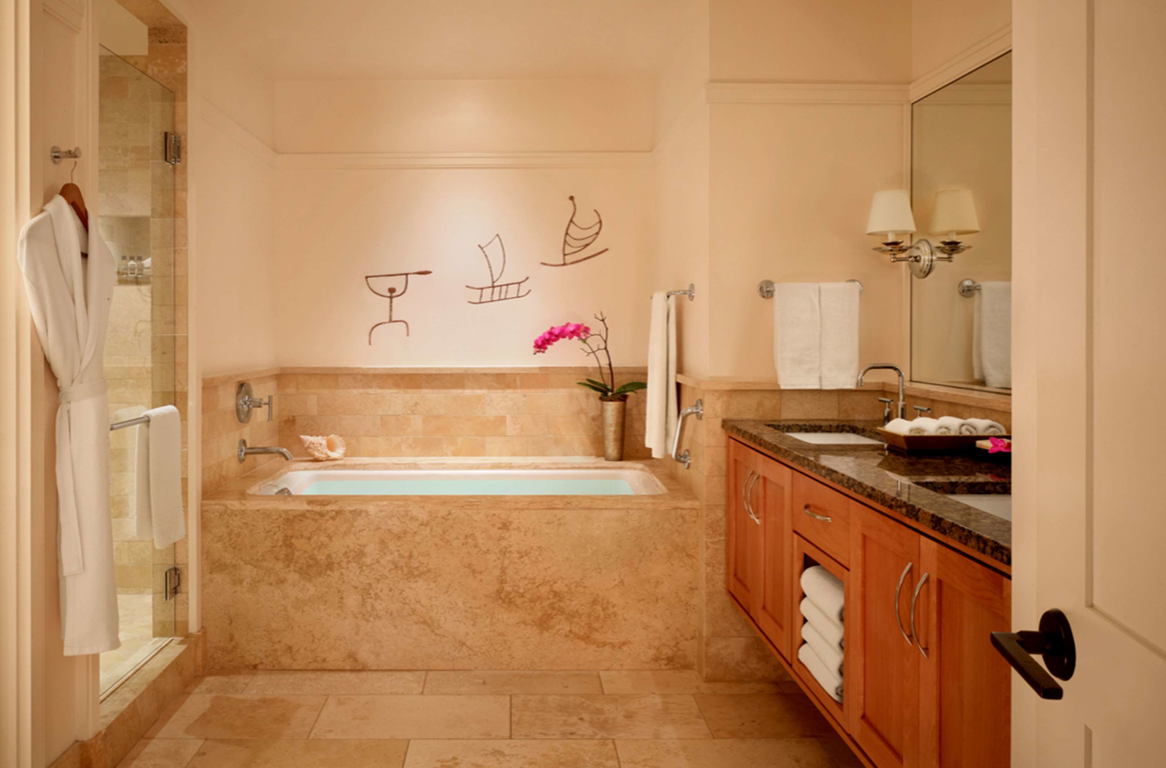 separate bathtub and shower, rainfall showerhead, designer toiletries