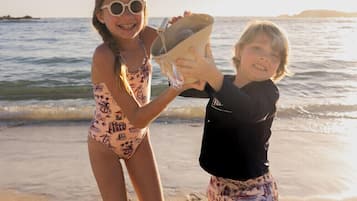 On the beach, beach towels, snorkeling, surfing