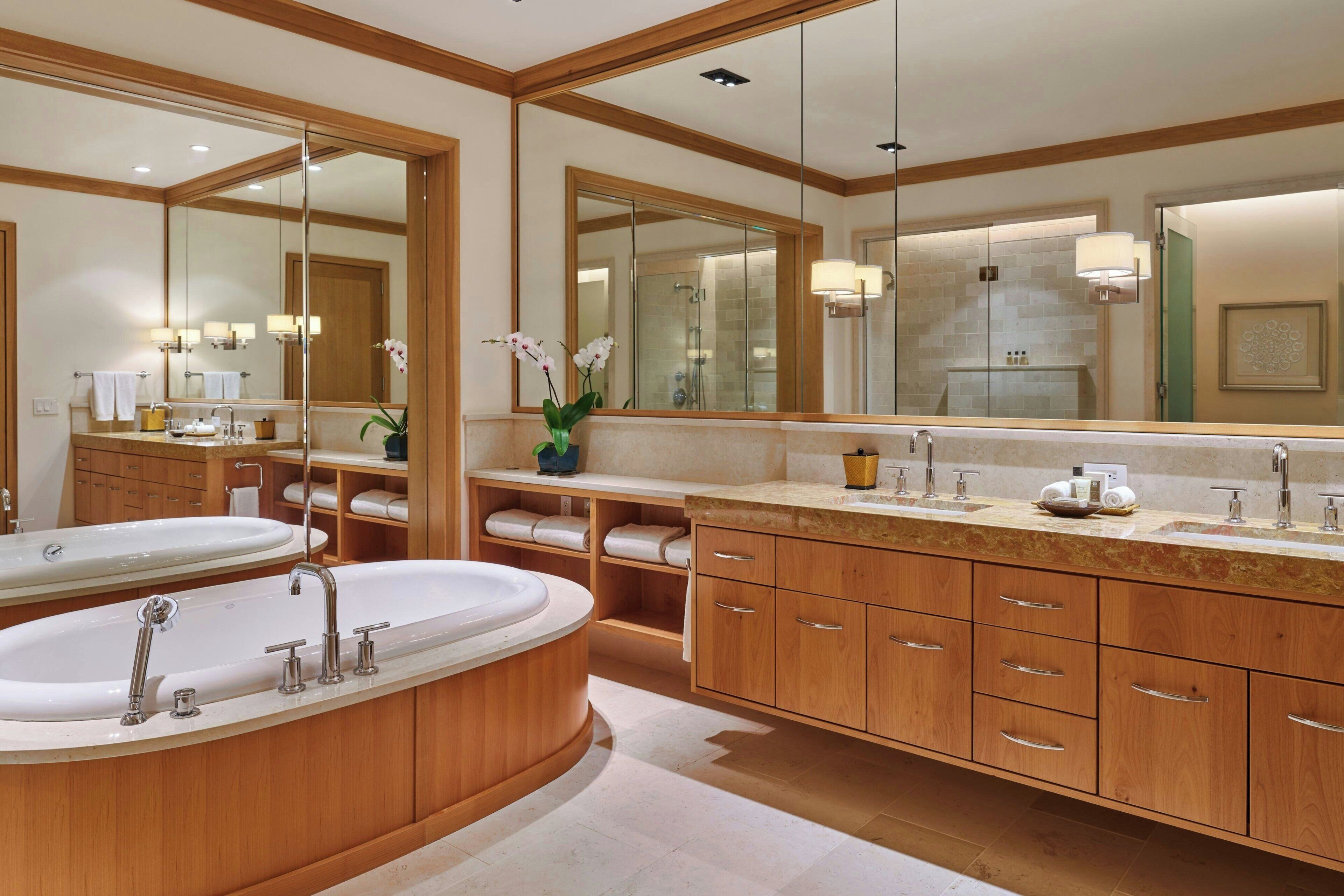 Separate bathtub and shower, rainfall showerhead, designer toiletries