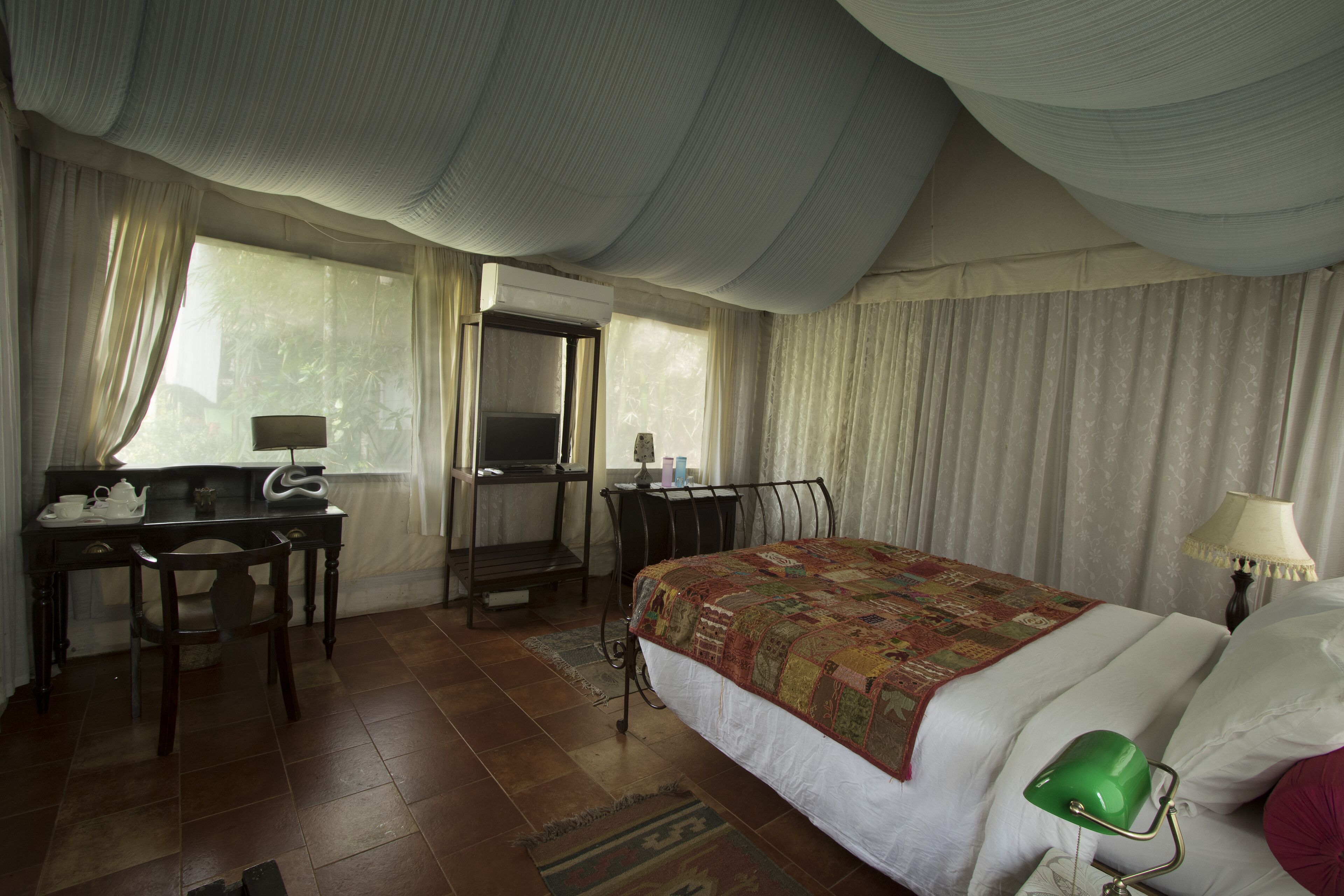 luxury tent | 1 bedroom, premium bedding, desk, soundproofing