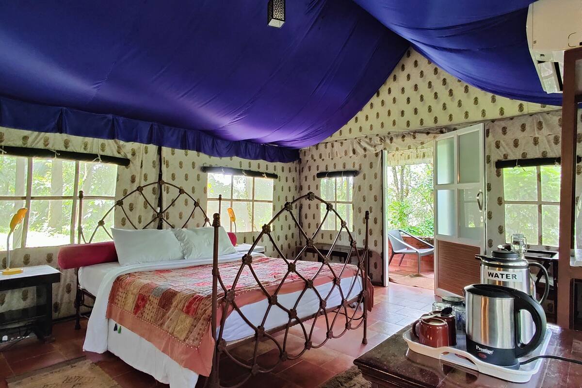 luxury tent | 1 bedroom, premium bedding, desk, soundproofing