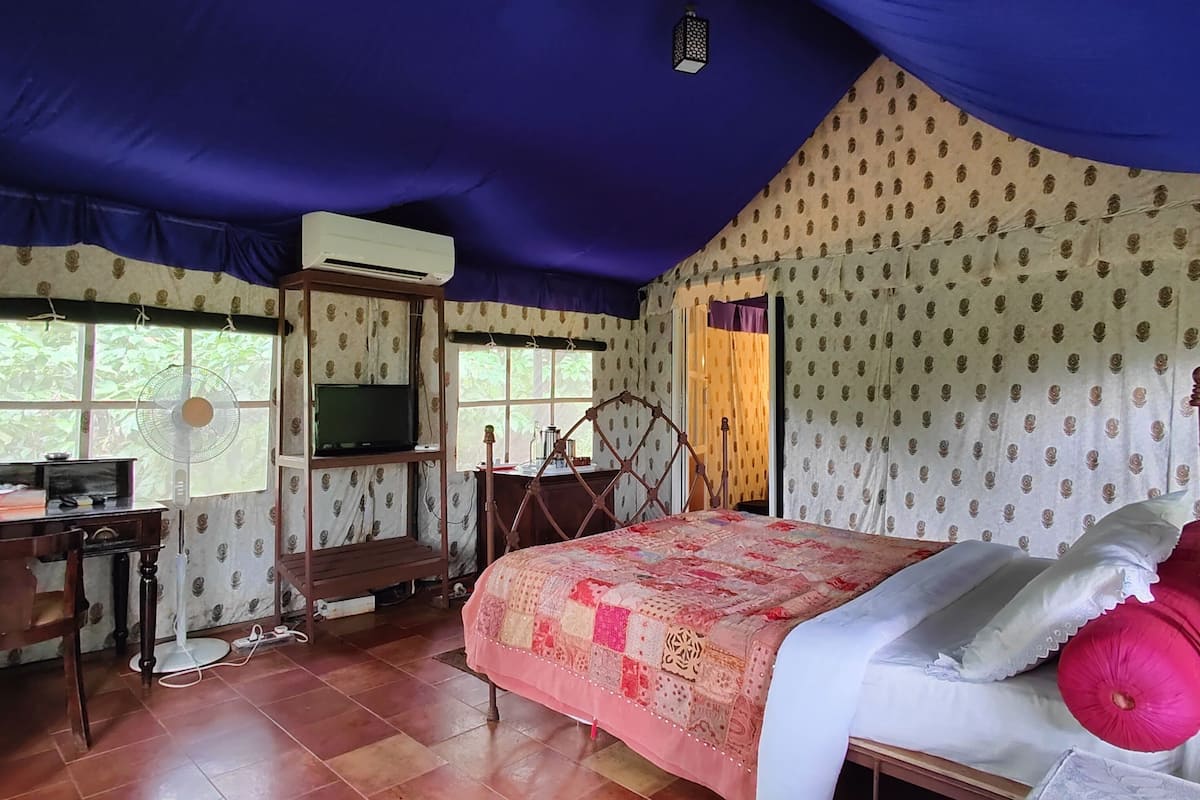luxury tent | 1 bedroom, premium bedding, desk, soundproofing