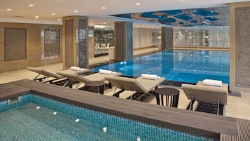 Indoor pool, open 10:00 AM to 10:00 PM, sun loungers