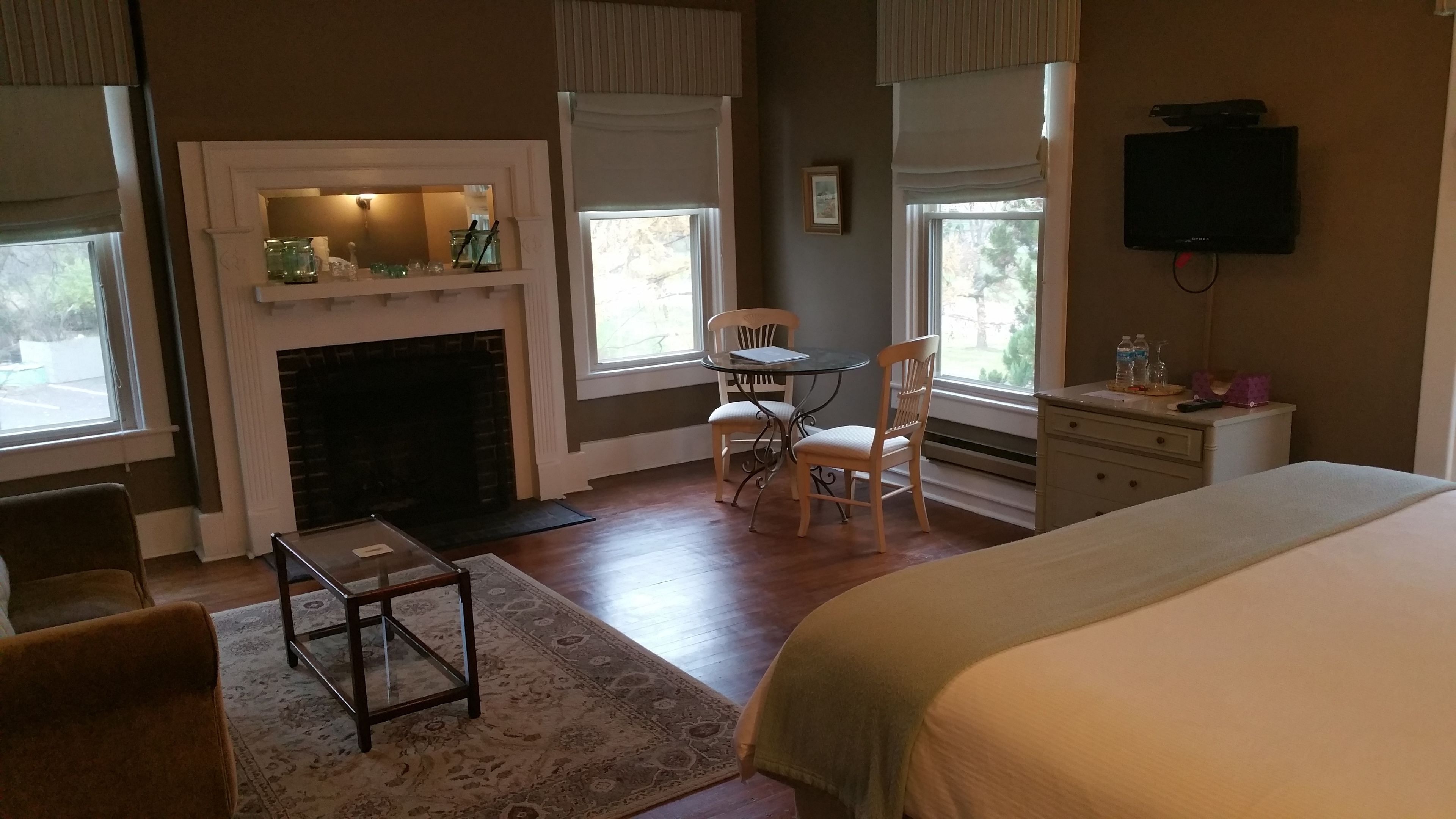 Superior Suite, 1 King Bed, Non Smoking (Hearthside) | Living area | 25-inch TV with satellite channels, DVD player