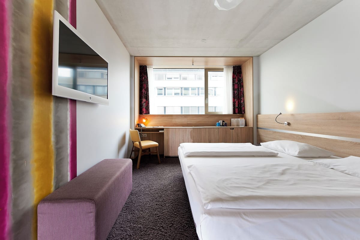 Biancheria da letto di alta qualità, minibar, cassaforte in camera